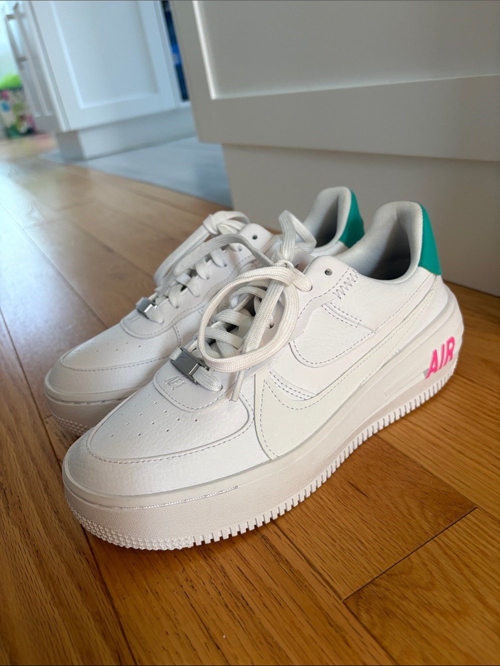 Nike Women’s White Sneakers with Teal Heel and Pink AIR